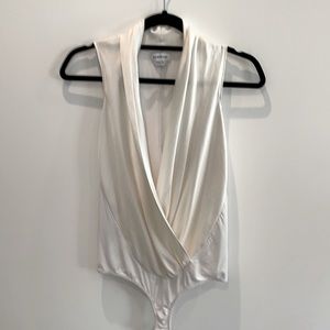 BEBE sleeveless bodysuit. White size. XS/TP